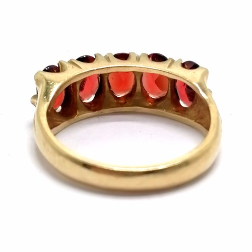 410 - 9ct hallmarked gold 5 garnet stone set ring - size N & 4.3g total weight - SOLD ON BEHALF OF THE NEW... 