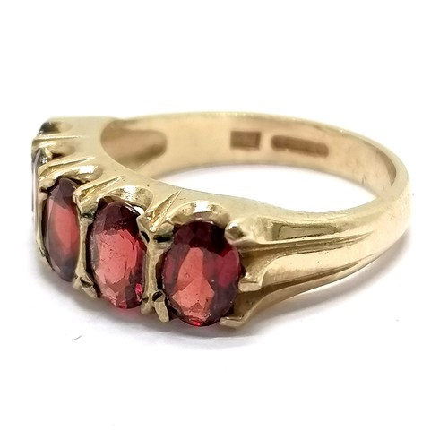 410 - 9ct hallmarked gold 5 garnet stone set ring - size N & 4.3g total weight - SOLD ON BEHALF OF THE NEW... 