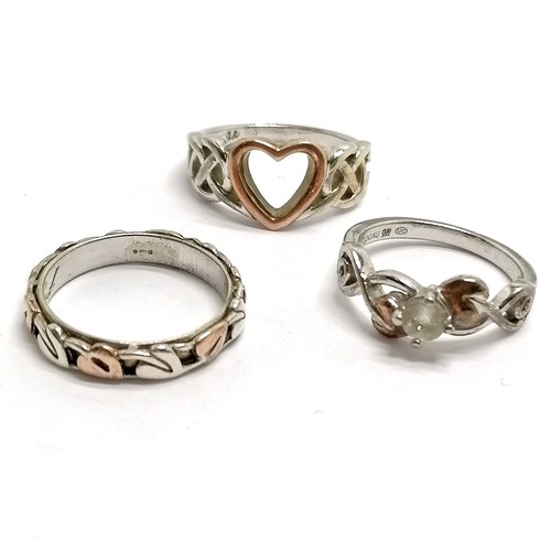 438 - 3 x Clogau silver / Welsh gold rings inc heart shaped, Cariad etc - sizes J-L t/w retail ring box & ... 