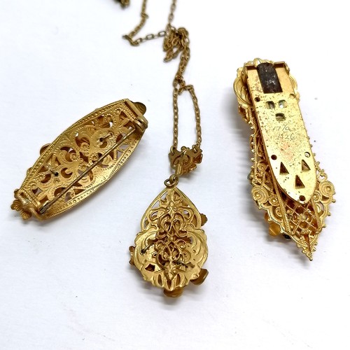 461 - French vintage Art Deco gilt metal pendant on gilt metal chain (38cm), matching dress clip & brooch ... 