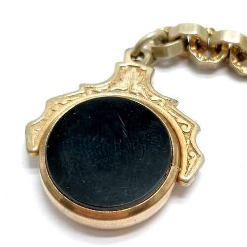 470 - Antique gilt metal fancy link albert chain with swivel fob set with onyx / bloodstone - 38cm total l... 