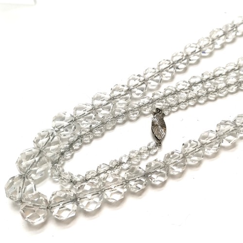 475 - Vintage boxed long cystal glass necklace (76cm) with silver clasp special made for J T Chanrai & Co.... 