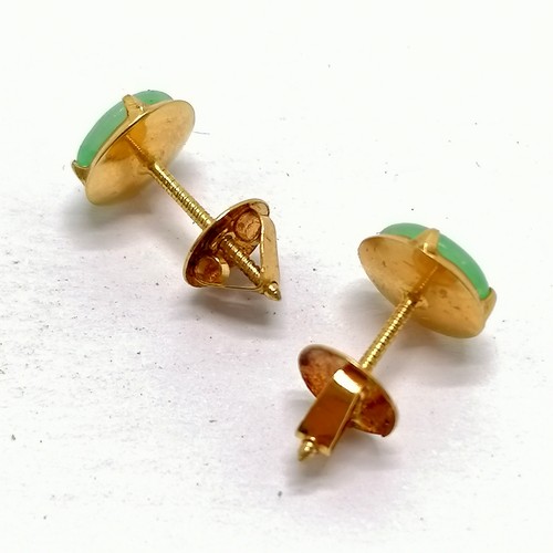 495 - Pair of unmarked gold jade earrings with screw on backs - 1.3g total weight - SOLD ON BEHALF OF THE ... 