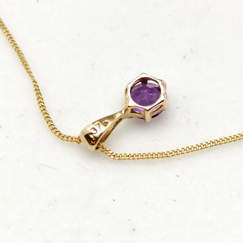 518 - 9ct marked gold amethyst set earrings / pendant on 44cm chain - total weight 1.4g & is in original r... 