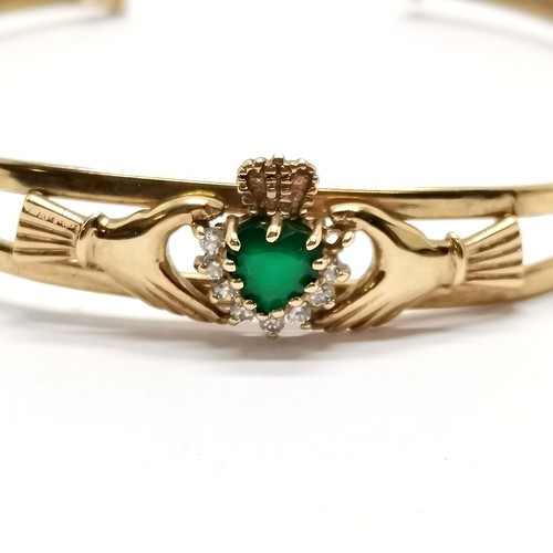 524 - 9ct hallmarked gold claddagh bangle set with heart shaped emerald & white stones (1 missing) - 5.2g ... 