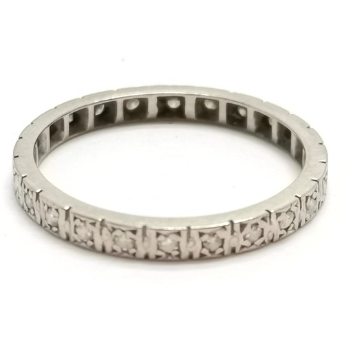 574 - Unmarked white gold (touch tests as higher carat) diamond set full eternity ring - size P & 2.5g tot... 