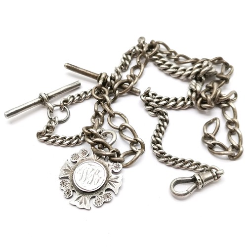 599 - 2 x antique silver albert chains - longest 32cm has a silver fob & the other lacks clasp - 65g