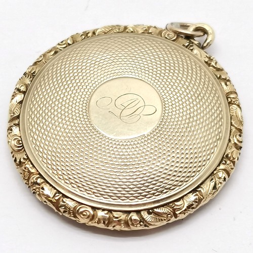 603 - Antique unmarked gold portrait pendant locket - 3.2cm diameter & 7.2g total weight