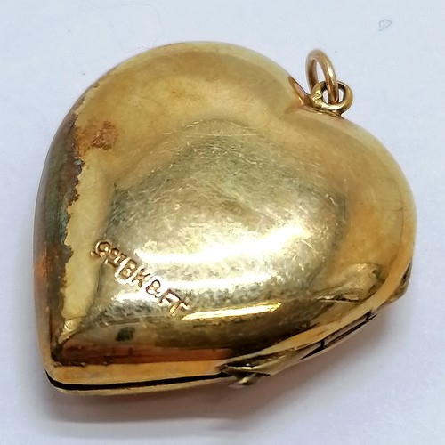 661 - 9ct gold back and front heart locket - 2.5cm drop & 5g total weight ~ slight dent to front otherwise... 