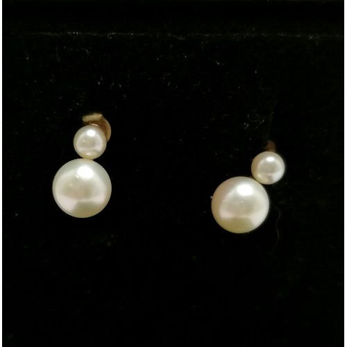 664 - Pair of 9ct marked gold pearl earrings - 1.4g total weight