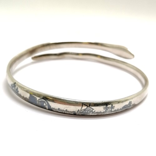 665 - Unmarked silver snake bangle with niello detail - 7.8cm diameter & 47g total weight