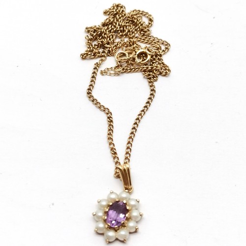 683 - 9ct hallmarked gold amethyst / pearl pendant on a 9ct marked gold 50cm chain - 4.8g total weight