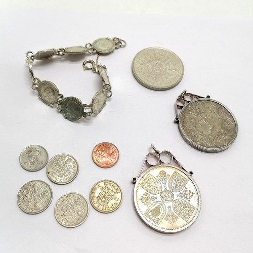 696 - Silver 3d coin bracelet t/w 3 QEII crowns (2 in silver pendant mounts) etc