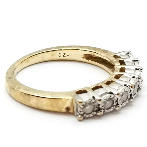 713 - 9ct marked gold diamond set (7) ring - size M & 3.7g total weight ~ diamond stated as 0.2cts inside ... 