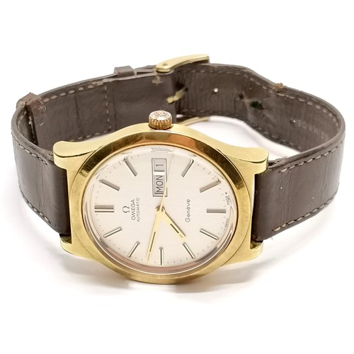 734 - Omega automatic day / date Geneve automatic wristwatch in a gold plated 35mm case on original leathe... 