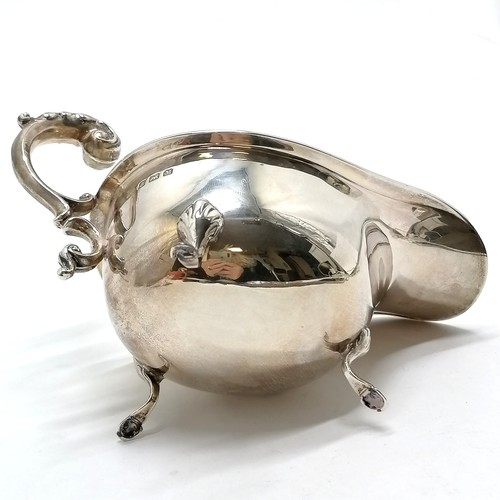 765 - 1936 silver hallmarked gravy boat terminating on 3 hoof feet by S Blanckensee & Son Ltd - 17cm acros... 