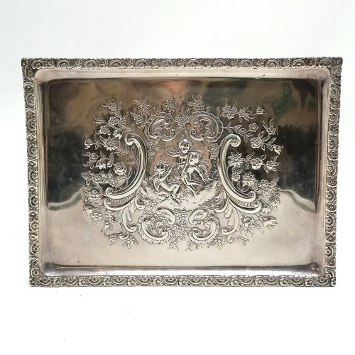 768 - Mappin & Webb 1901 good quality silver heavy tray with embossed cherub detail to centre - 27cm x 20c... 