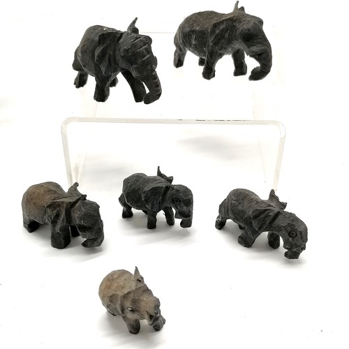 43 - Qty of elephant figures inc hand carved ebony, onyx (8cm total height), sandalwood etc - some a/f