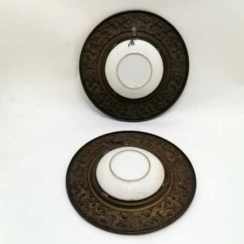 45 - Antique pair of porcelain wall chargers with embossed metal surrounds - 30cm diameter - pin holes to... 