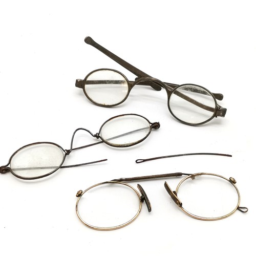 51 - Pair of antique unmarked silver spectacles with double folding arms - 10.5cm across t/w 2 pairs of s... 