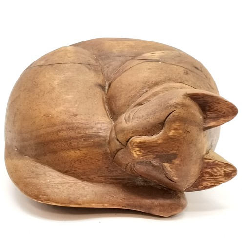 56 - Hand carved model of a sleeping cat - 25cm across x 14cm high