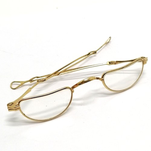 59 - Antique gold plated pair of reading spectacles with extending arms by Luna (Germany) - 12cm across