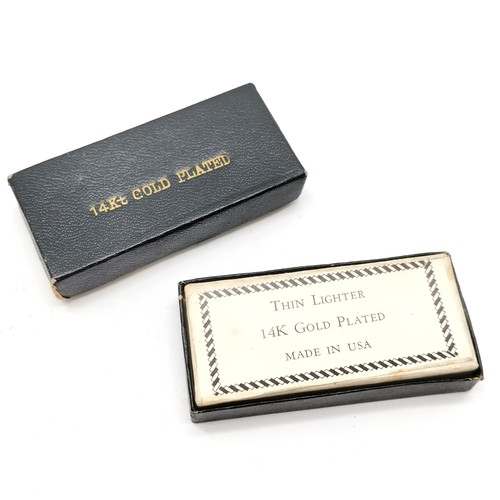 154 - Pair Virginia slims 14k gold plated lighters in their original boxes 6cm x 3cm, in unused condition