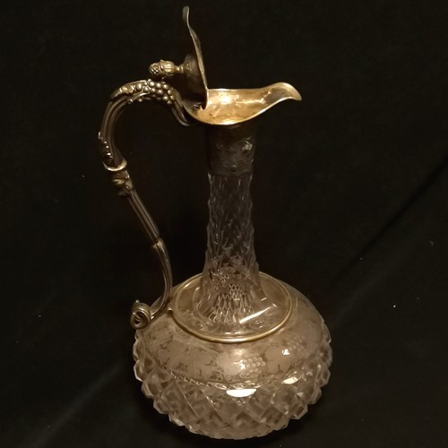 158 - Victorian cut glass claret jug with silver plated mounts with pineapple finial and etched grape vine... 