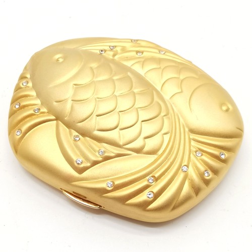 184 - Estee Lauder Pisces gold tone powder compact in original retail packaging - in unused condition but ... 