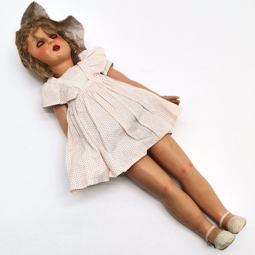 196 - 1947 Vintage composite walking doll, in an original condition and complete with clothing, Bought as ... 