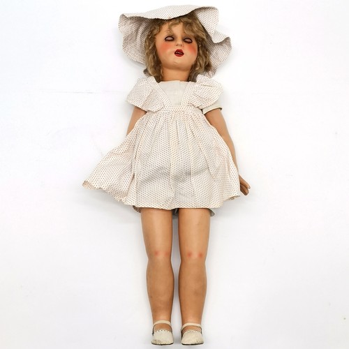 196 - 1947 Vintage composite walking doll, in an original condition and complete with clothing, Bought as ... 