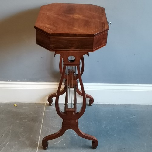 204 - Antique walnut work table on liar supports and scroll legs, 46 cm wide, 38 cm deep, 80 cm high, in g... 