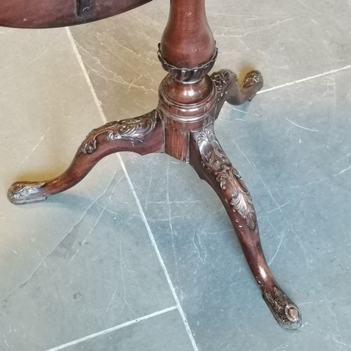 207 - Antique mahogany tilt top occasional table on turned and reeded column terminating on carved tripod ... 