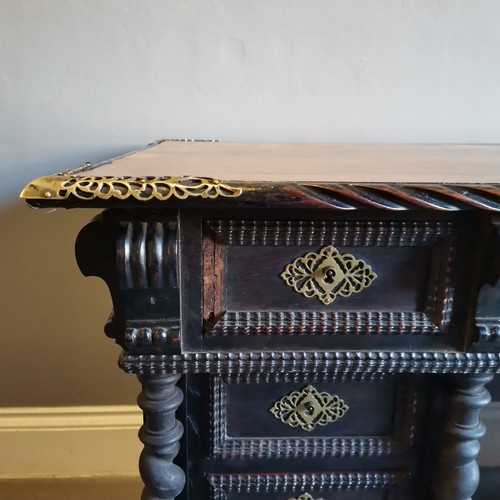 210 - Antique ebonised pedestal leather top writing desk with carved and brass fretwork decoration, turned... 