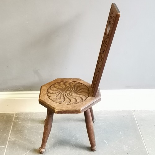 215 - Antique carved oak high backed spinning chair with heart detail measuring 36cm x 38cm x 89cm. Used c... 