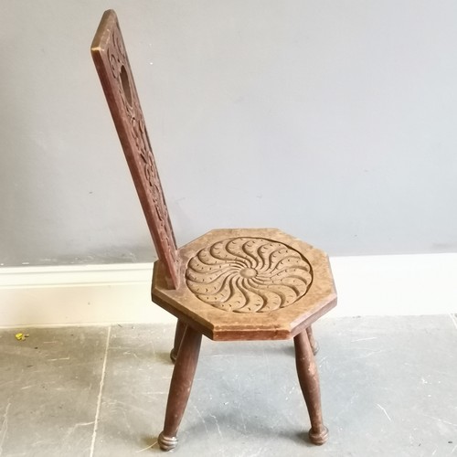 215 - Antique carved oak high backed spinning chair with heart detail measuring 36cm x 38cm x 89cm. Used c... 