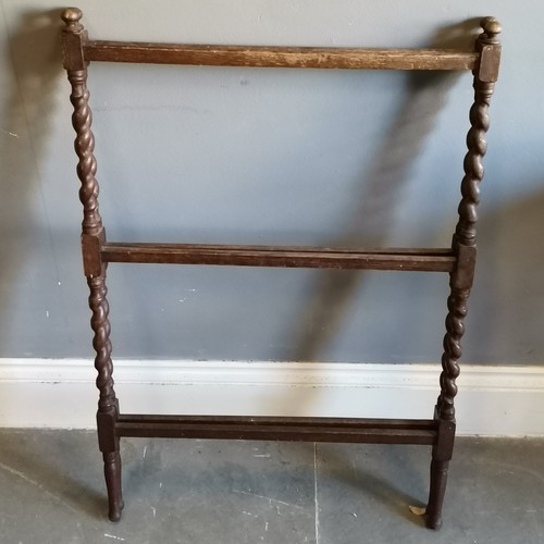 216 - 1930s Oak clothes airer with barley twist supports. Measures 62cm x 92cm. Used condition.