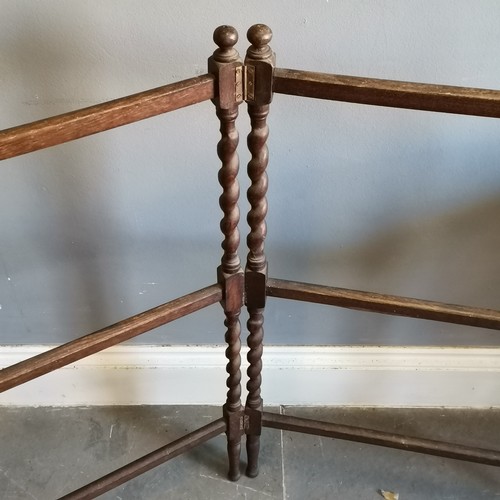 216 - 1930s Oak clothes airer with barley twist supports. Measures 62cm x 92cm. Used condition.