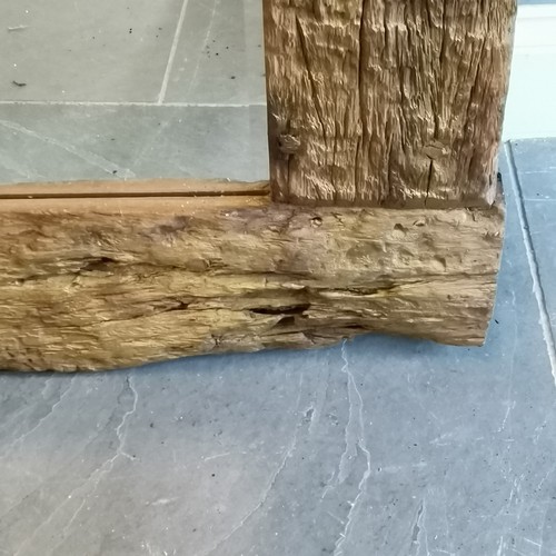 223 - Large driftwood framed bevelled edge mirror measuring 100cm wide x 200cm high.