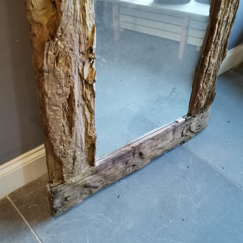 224 - Large driftwood bevelled edge mirror with slight repairs. Measuring 100cm wide x 200cm high.