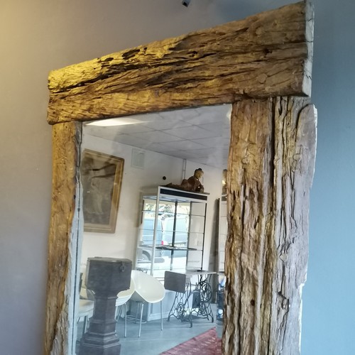 224 - Large driftwood bevelled edge mirror with slight repairs. Measuring 100cm wide x 200cm high.