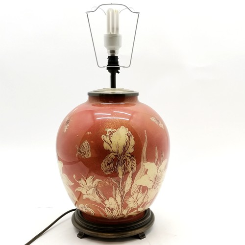 235 - Contemporary floral decorated rust ground lamp complete with shade, lamp base, 44 cm high, good used... 