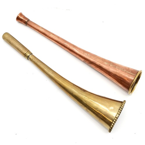 291 - Brass hunting horn 24cm long T/W copper and brass hunting horn - both have some dents