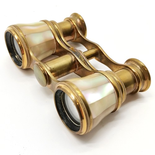 292 - Pair of Jumelle Marine binoculars, cased Nikon binoculars T/W a small pair of brass and mother of pe... 