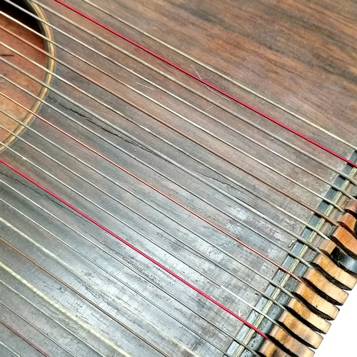 315 - Antique rosewood 32 string zither with strung inlay detail 52cm x 31cm - 2 strings missing, damage t... 