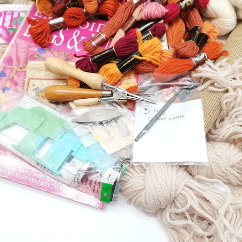 183 - Box containing assorted rug making items to include wool, books etc.
