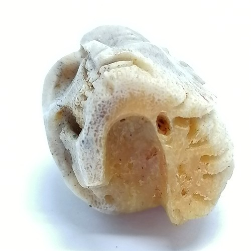 193 - Antique carved bone memento mori (2cm) t/w 3 x vegetable root votives & crucifix