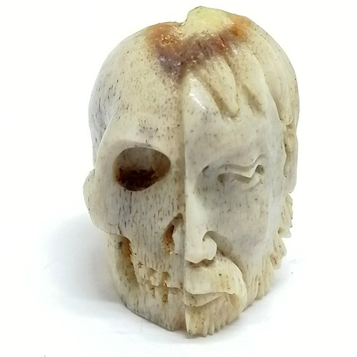 193 - Antique carved bone memento mori (2cm) t/w 3 x vegetable root votives & crucifix