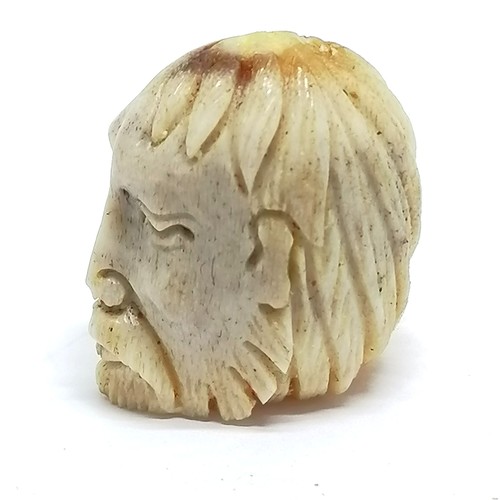 193 - Antique carved bone memento mori (2cm) t/w 3 x vegetable root votives & crucifix