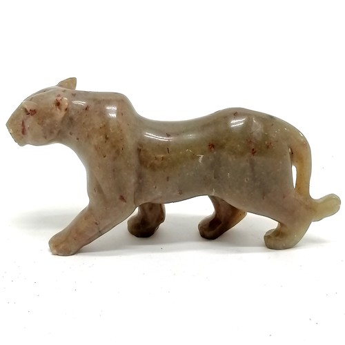 201 - Carved soapstone figure of a leopard signed C N Doti - 13cm across & slight nibbles otherwise no obv... 